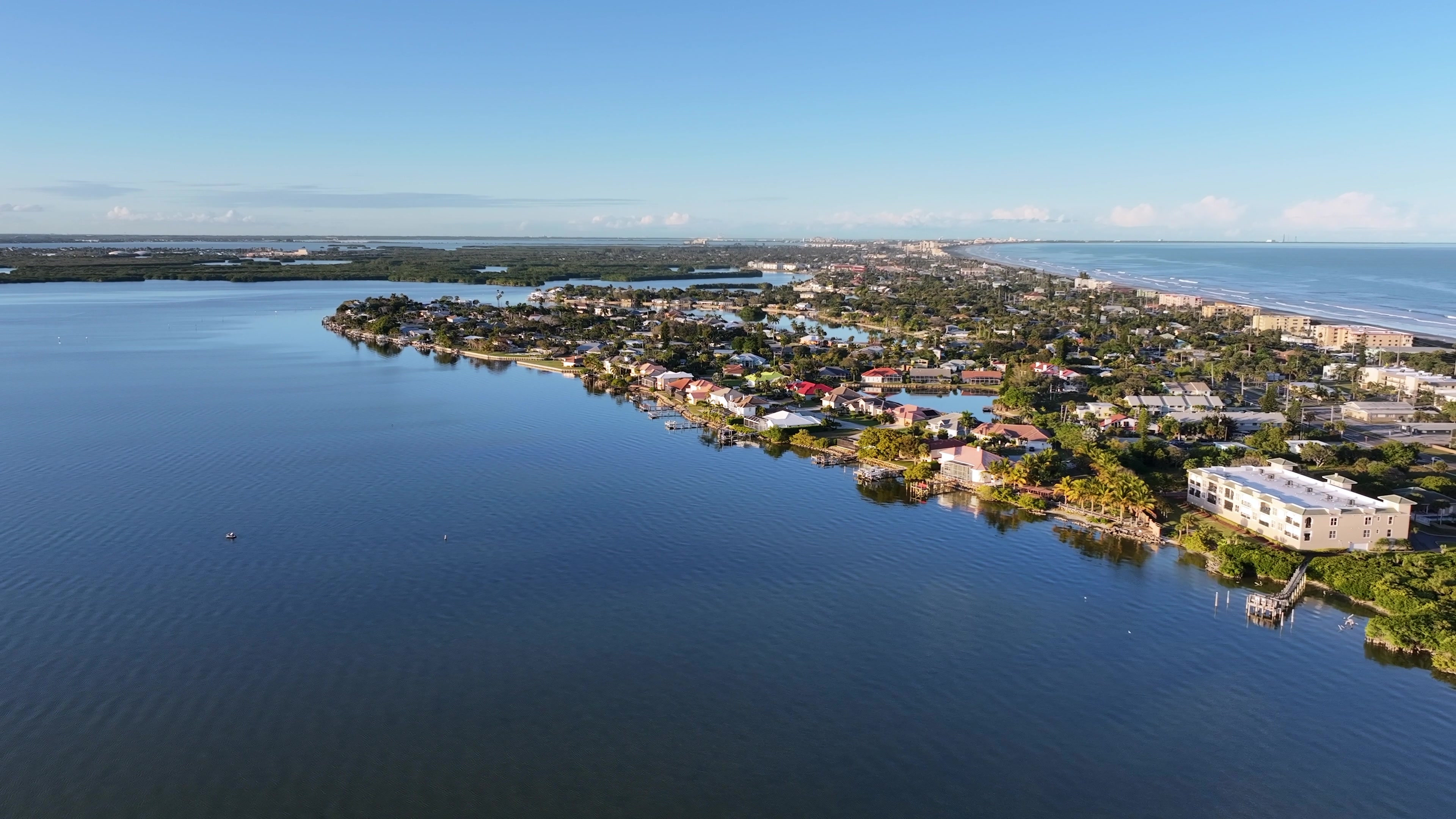 Aerial of a Florida beach and breaking surf