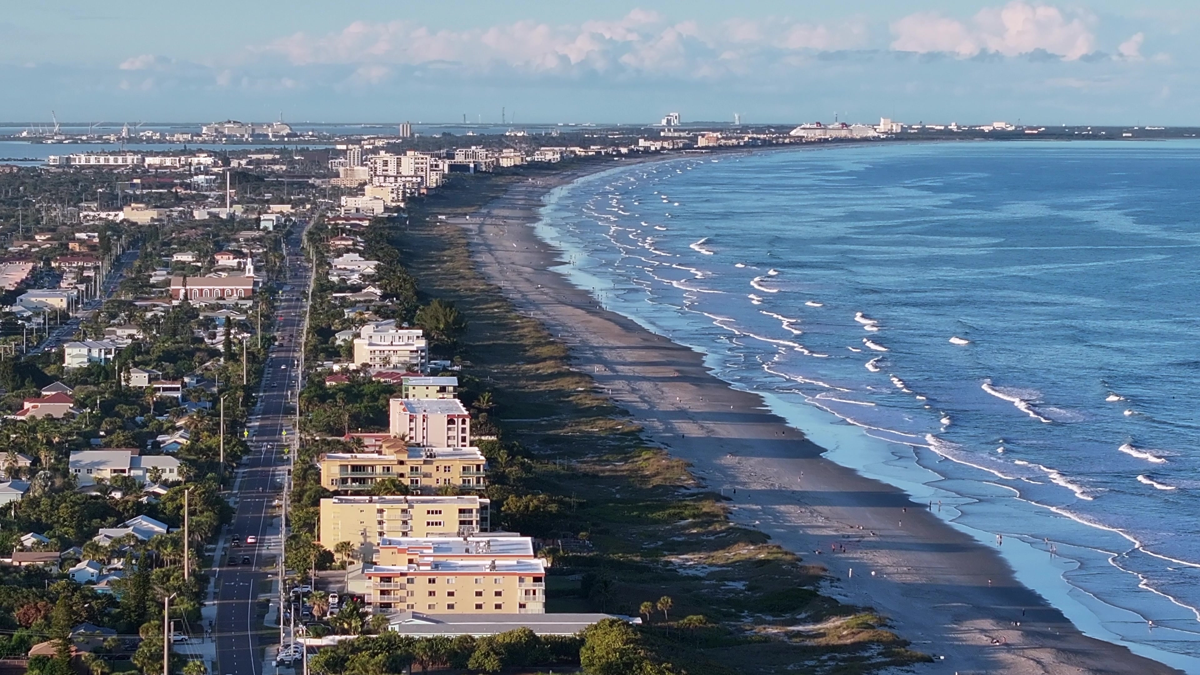 Aerial Florida Space Coast Coastline with Waves and Cape Canaveral