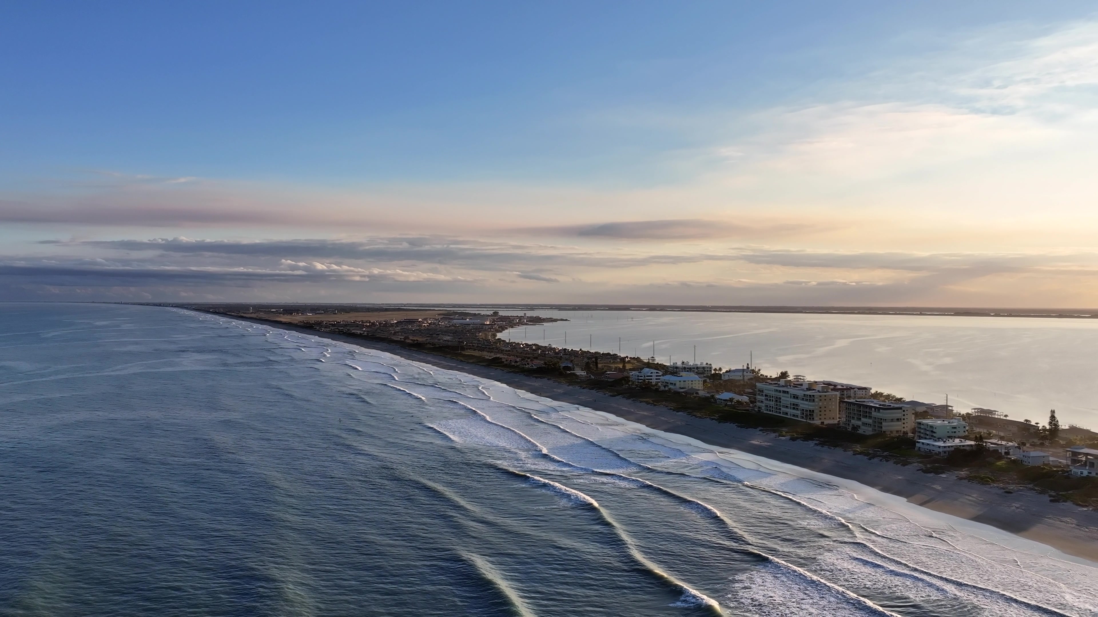Sunset Over Florida Barrier Island with Ocean Waves and Lagoon